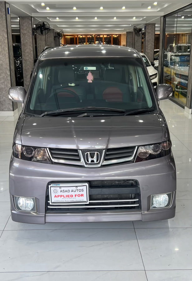 Honda Zest (2009) Compact Japanese Hatchback with Practical Comfort