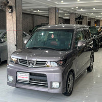 Honda Zest (2009) Compact Japanese Hatchback with Practical Comfort