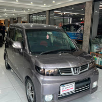 Honda Zest (2009) Compact Japanese Hatchback with Practical Comfort