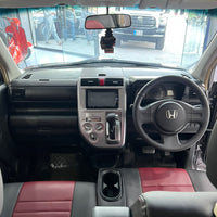 Honda Zest (2009) Compact Japanese Hatchback with Practical Comfort