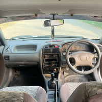 Suzuki Baleno JXR (2002) Reliable Family Sedan with Lasting Comfort